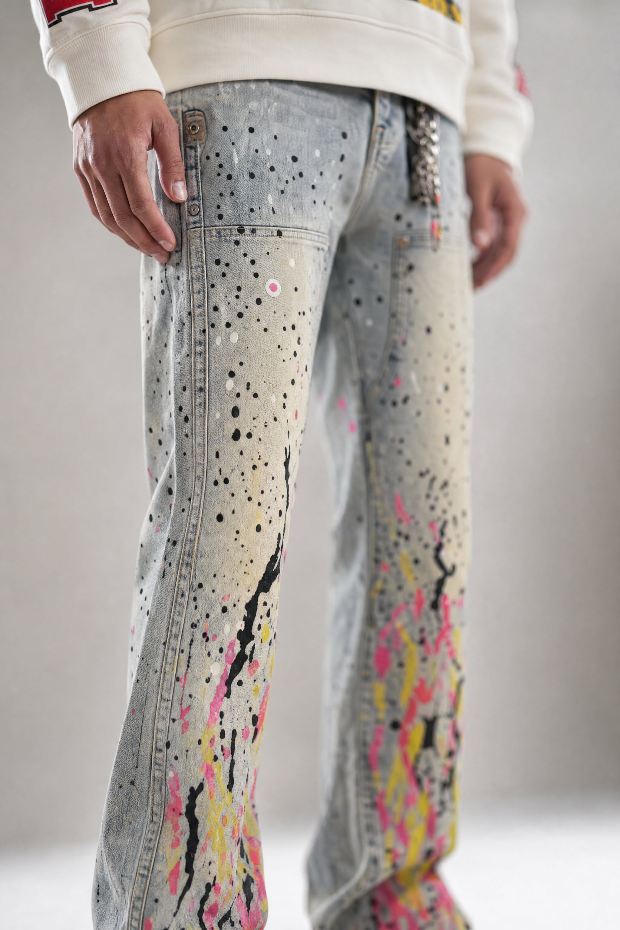 Red Poppy Splatter Jeans - Stacked