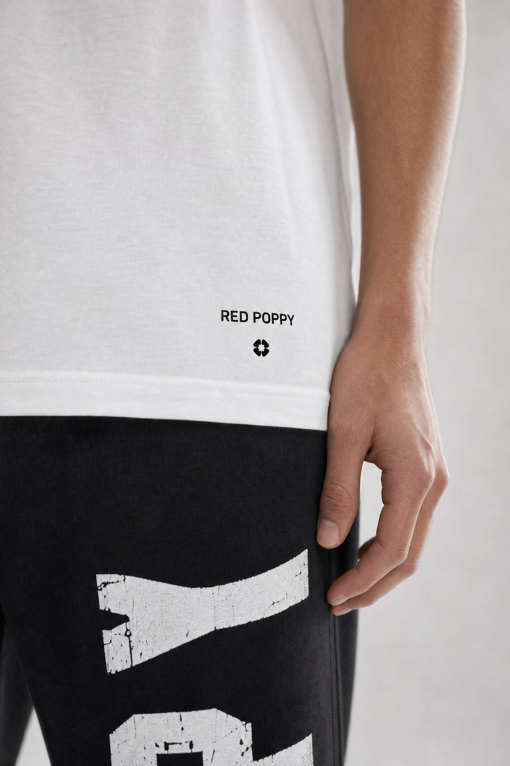 Red Poppy Minimal Tee - Logo Detail