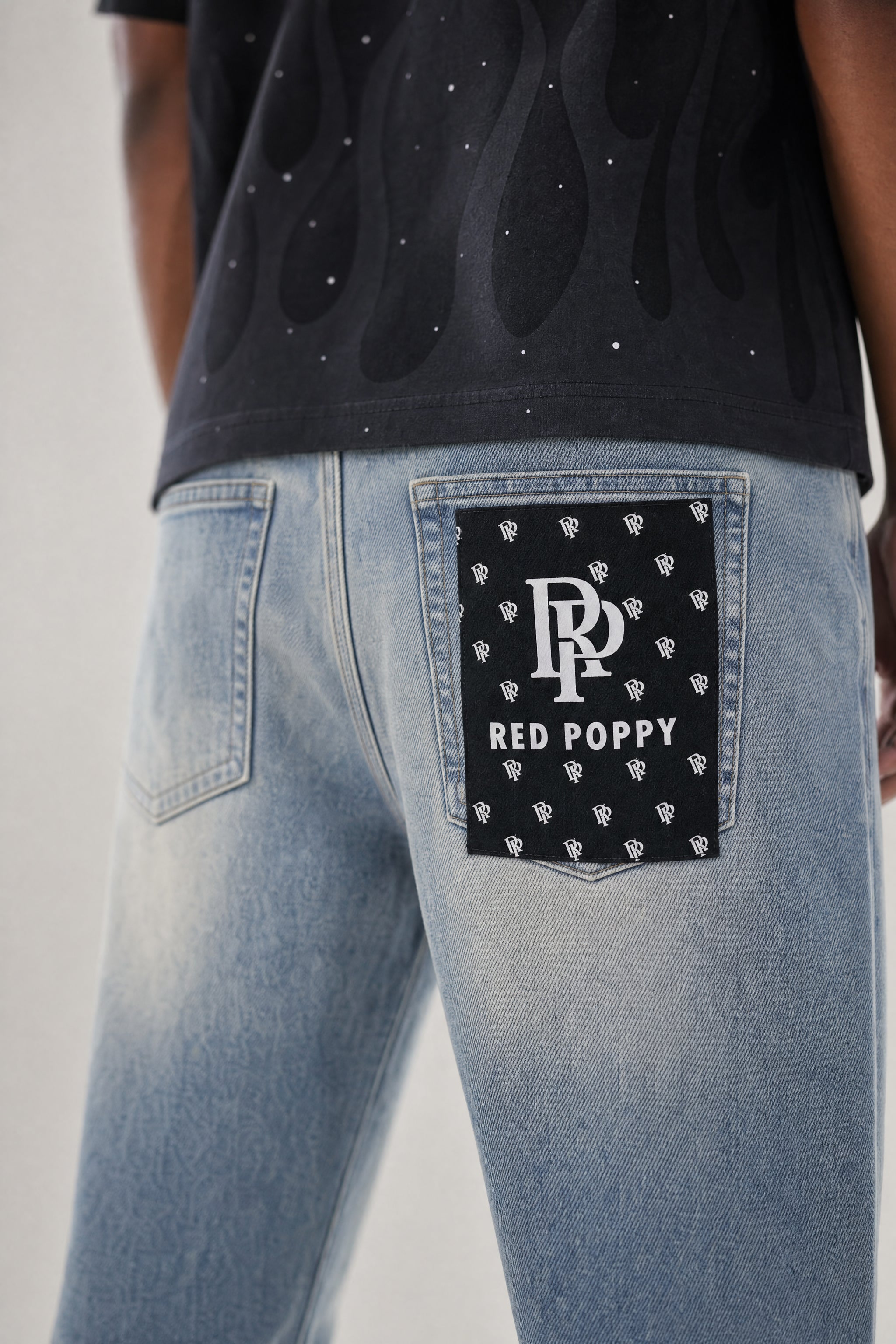 Red Poppy Text Jeans - Graphic